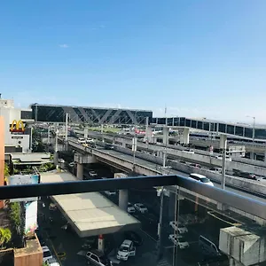 One Palm Tree Across Naia-t3 Apartment